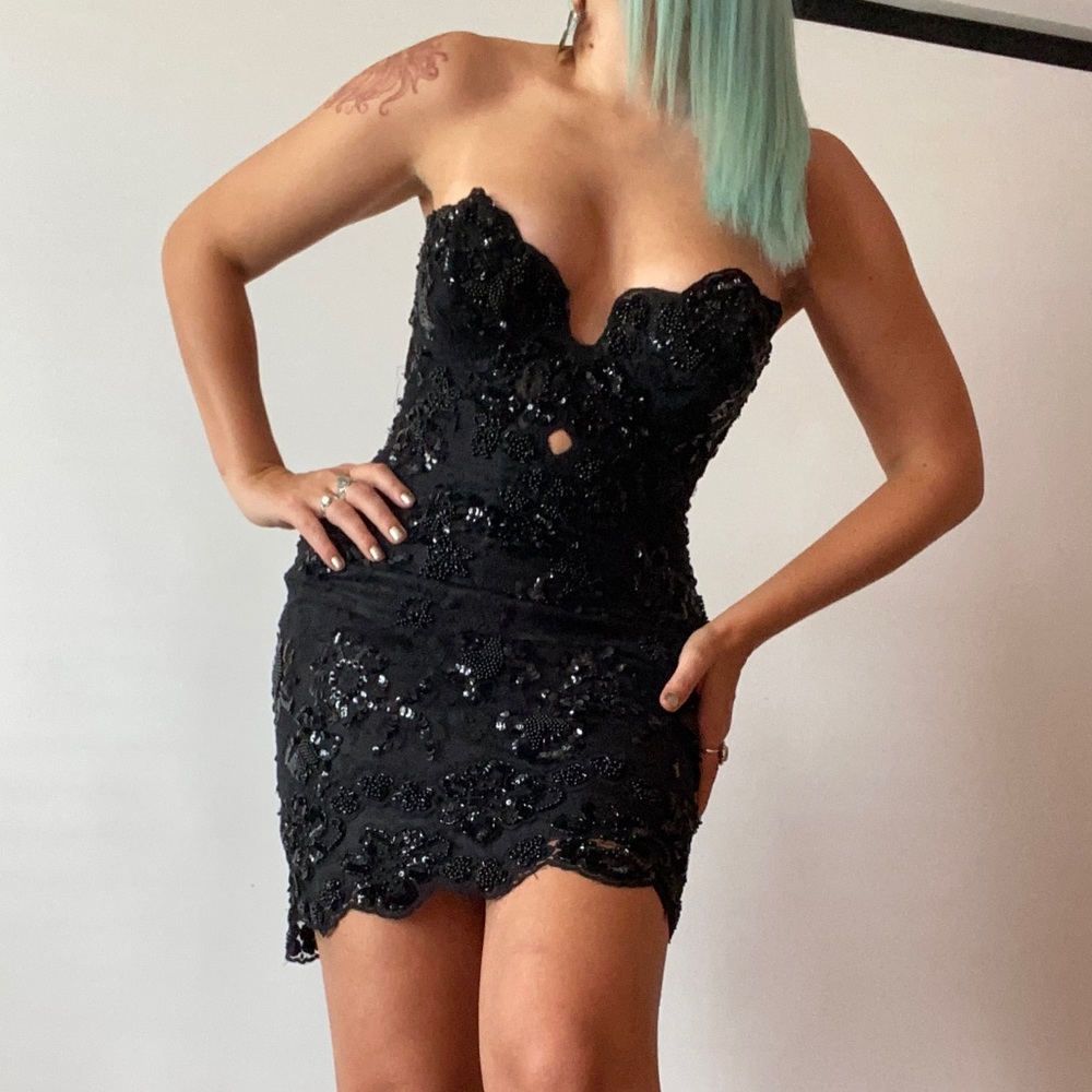BOMBSHELL beaded black mini dress with sweetheart cut, keyhole, scalloped trim